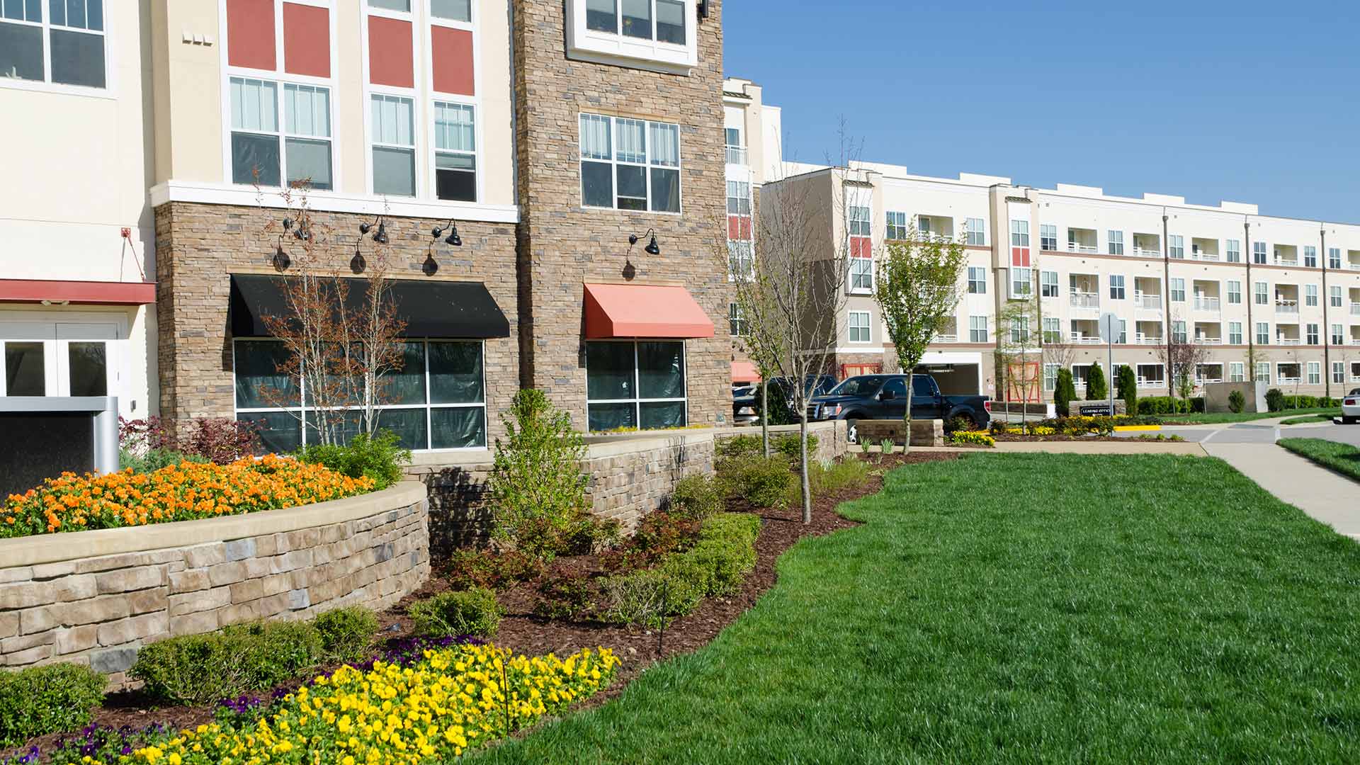 Commercial property in Ankeny, IA with regular lawn care and landscaping services.