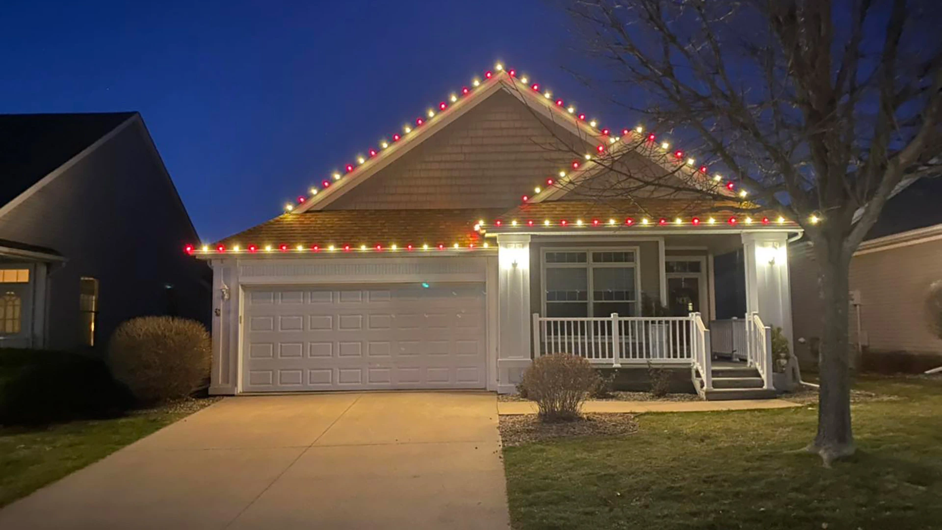 Holiday string lights added to home in Ankeny, IA.