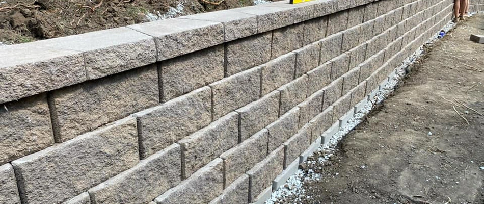 A retaining wall being installed in Altoona, IA.