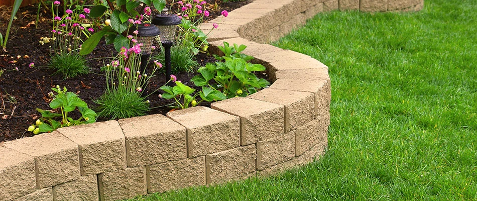 Retaining wall for landscape bed in Des Moines, IA.